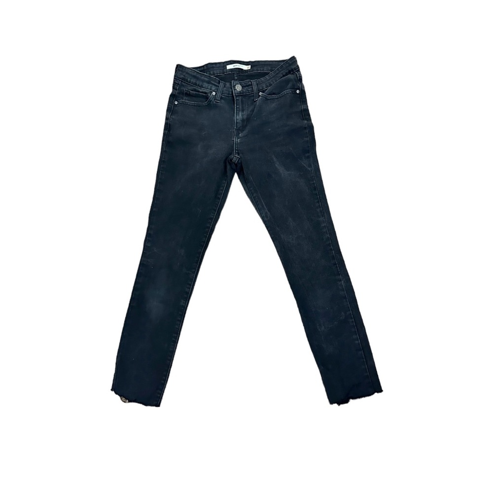 Levi’s 711 frayed hem aged jeans in a faded black 27x28